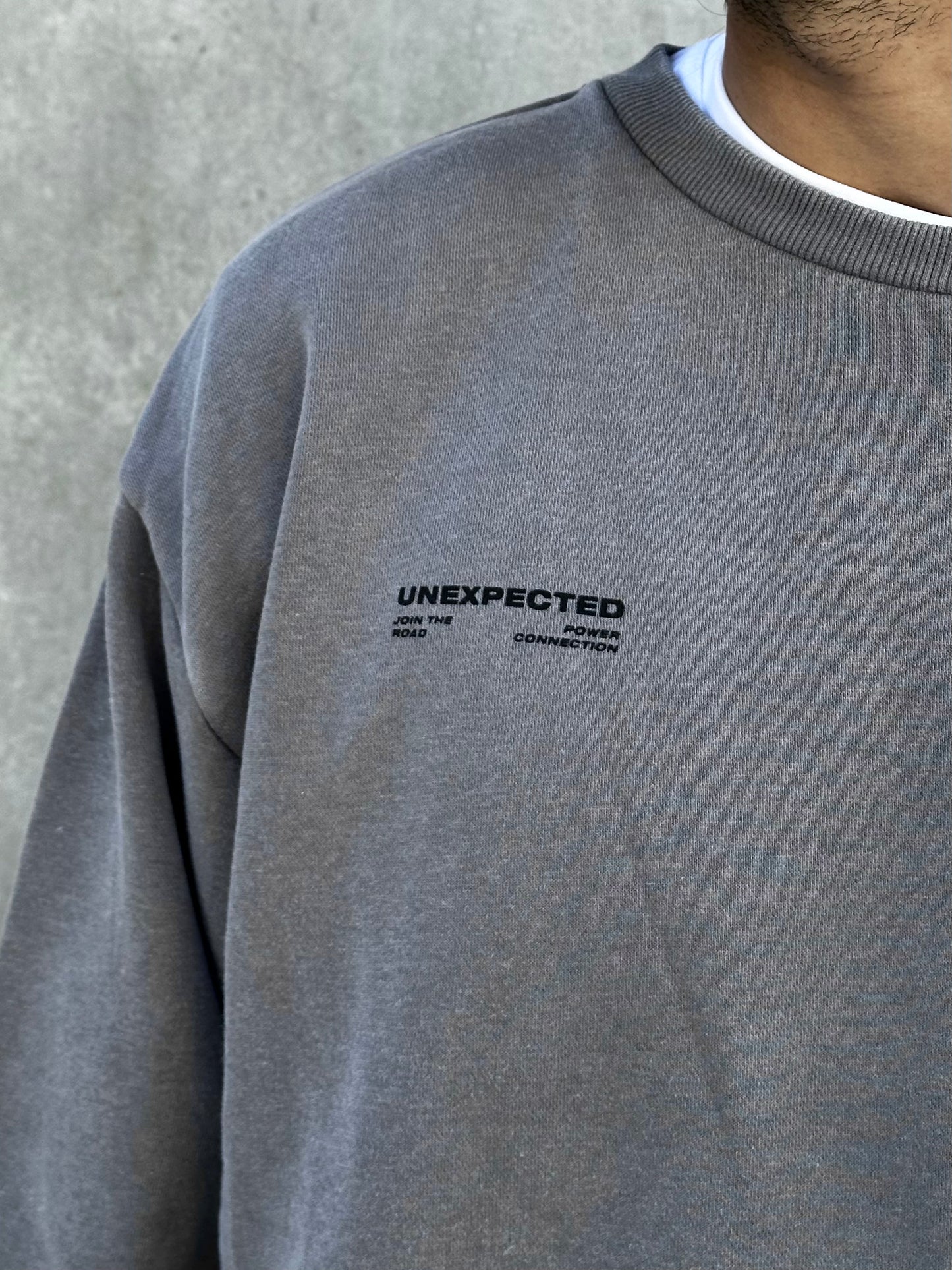 Buzo UNEXPECTED gris